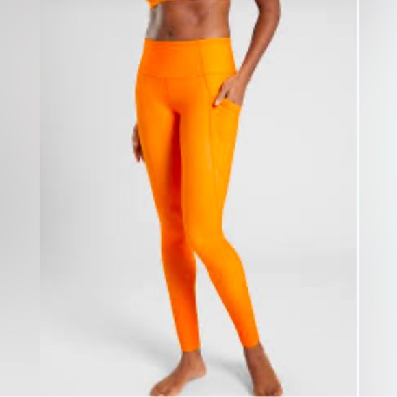 Athleta salutation stash pocket leggings in foliage orange - Picture 2 of 8
